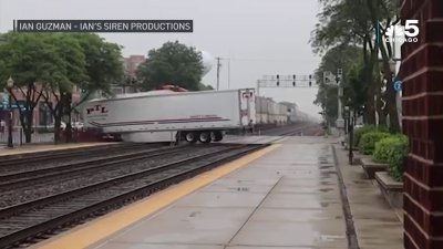 Shocking video shows train colliding with semitruck in Chicago's west suburbs