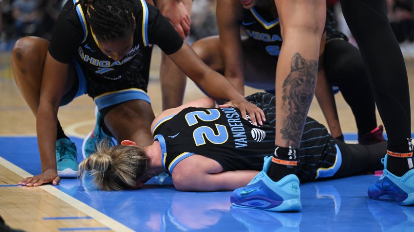 CHICAGO, ILLINOIS – JUNE 07: Courtney Vandersloot #22 of the Chicago Sky lies on the court after being injured against the Indiana Fever during the first half at the United Center on June 07, 2025 in Chicago, Illinois. NOTE TO USER: User expressly acknowledges and agrees that, by downloading and or using this photograph, user is consenting to the terms and conditions of the Getty Images License Agreement. (Photo by Daniel Bartel/Getty Images)